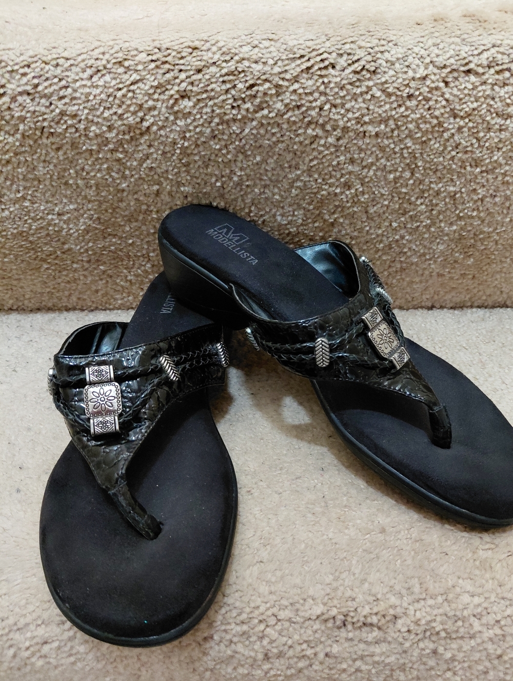 Black Embossed Thong Sandals with Decorative Metal Accents